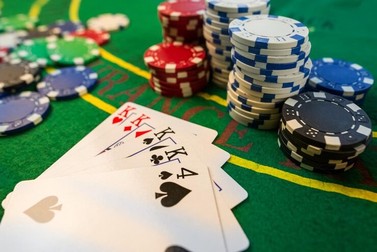 Multi-camera live-dealer table interface on gb88 mobile app showing bet controls and live chat during baccarat round